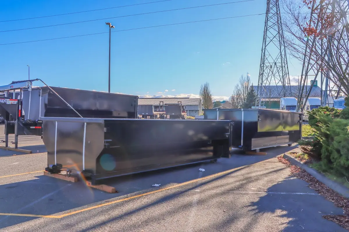 Roll-off dumpster ready for waste disposal at job site for Demolition Dumpster Rental in Harriman